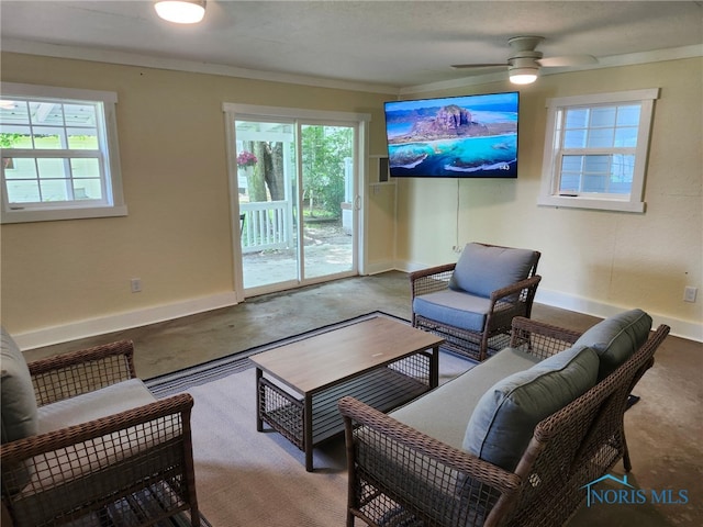 1019 Wayne Ave, Defiance, OH 43512 - living room featuring a ceiling fan and unfinished concrete flooring