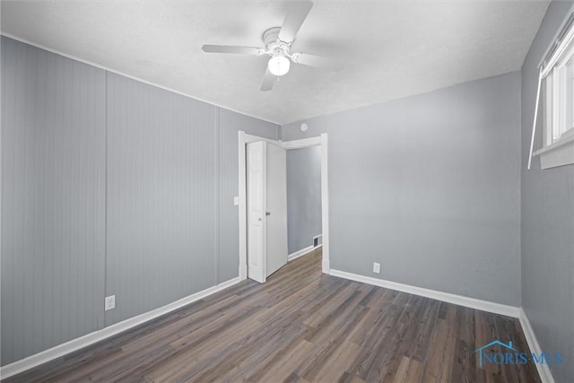 5542 N Summit St, Toledo, OH 43611 - unfurnished room featuring wood finished floors and a ceiling fan