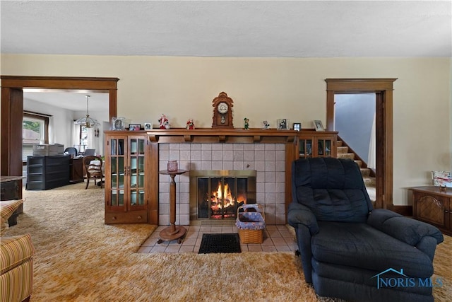 125 Cherry St, Wauseon, OH 43567 - living room with a tile fireplace and carpet flooring