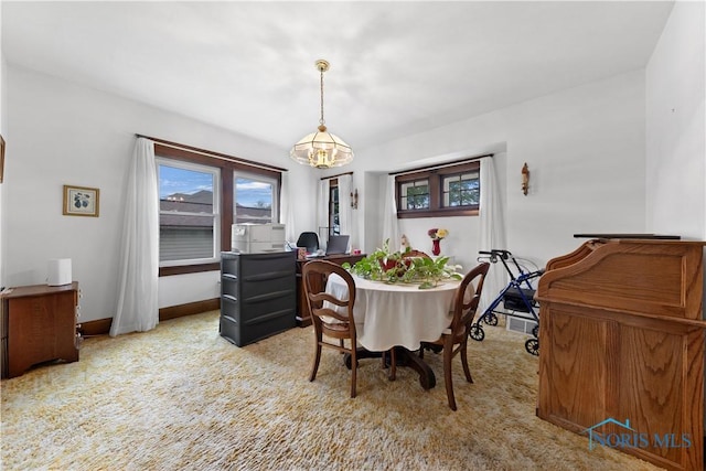 125 Cherry St, Wauseon, OH 43567 - carpeted dining room featuring baseboards and an office area