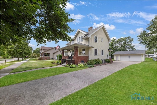 125 Cherry St, Wauseon, OH 43567 - view of front facade featuring an outdoor structure, a chimney, a front lawn, a garage, and brick siding