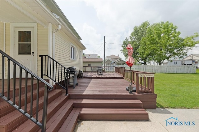 125 Cherry St, Wauseon, OH 43567 - wooden terrace with a grill