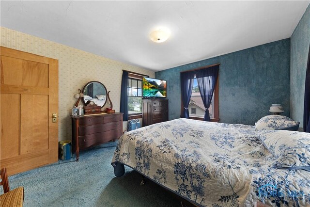 125 Cherry St, Wauseon, OH 43567 - carpeted bedroom with wallpapered walls