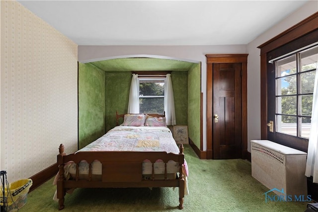 125 Cherry St, Wauseon, OH 43567 - carpeted bedroom with wallpapered walls and baseboards