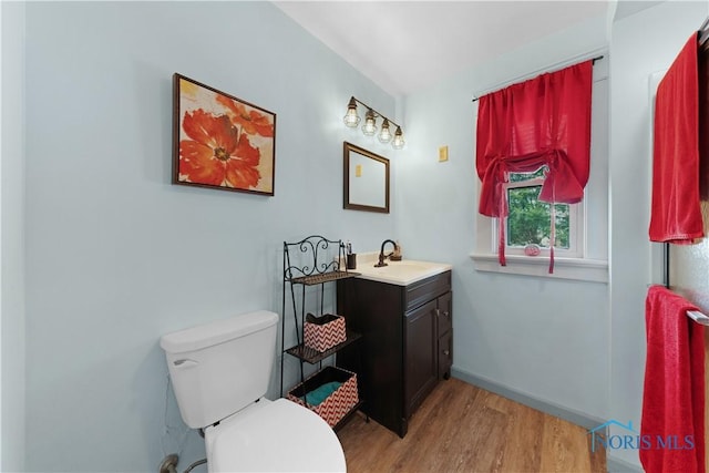 125 Cherry St, Wauseon, OH 43567 - bathroom with vanity and wood finished floors