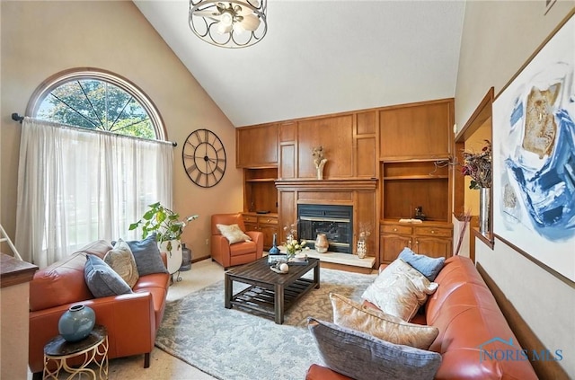 4871 Olde Meadow Ln, Sylvania, OH 43560 - living area featuring high vaulted ceiling, carpet flooring, a glass covered fireplace, and a chandelier