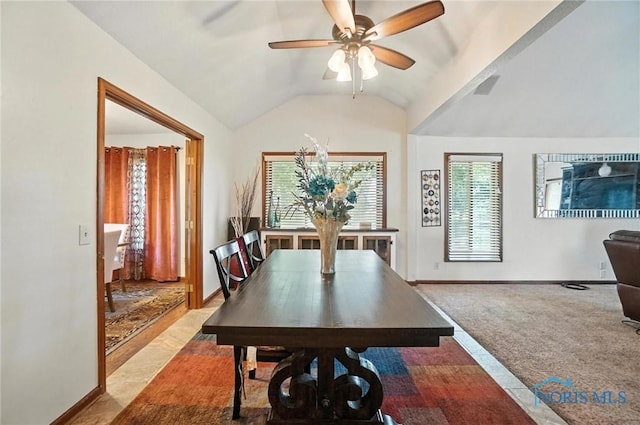 4871 Olde Meadow Ln, Sylvania, OH 43560 - dining area with a ceiling fan, vaulted ceiling, and carpet flooring
