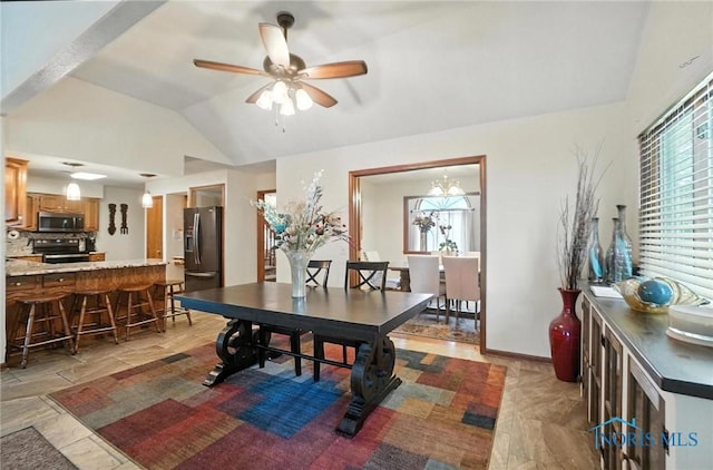 4871 Olde Meadow Ln, Sylvania, OH 43560 - dining area with vaulted ceiling and ceiling fan