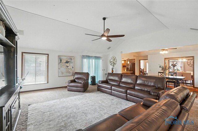 4871 Olde Meadow Ln, Sylvania, OH 43560 - carpeted living room featuring a ceiling fan and vaulted ceiling