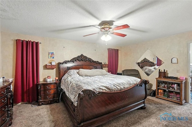 4871 Olde Meadow Ln, Sylvania, OH 43560 - carpeted bedroom featuring a ceiling fan and a textured ceiling
