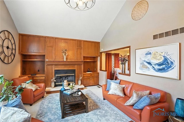 4871 Olde Meadow Ln, Sylvania, OH 43560 - living room with high vaulted ceiling, a glass covered fireplace, and light colored carpet