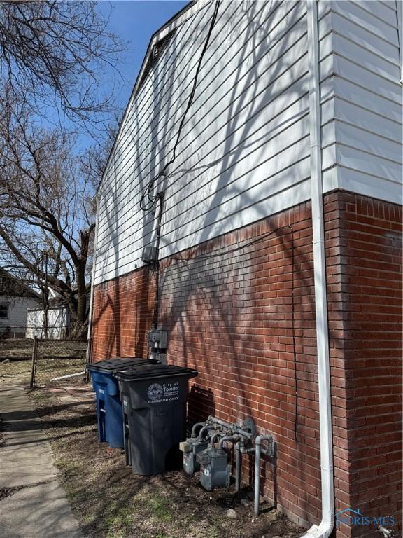 3031 Douglas Rd, Toledo, OH 43606 - view of home's exterior featuring brick siding