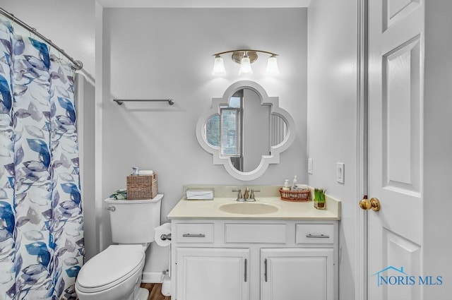 2923 Belle Glade Dr, Toledo, OH 43617 - bathroom with vanity and a shower with shower curtain