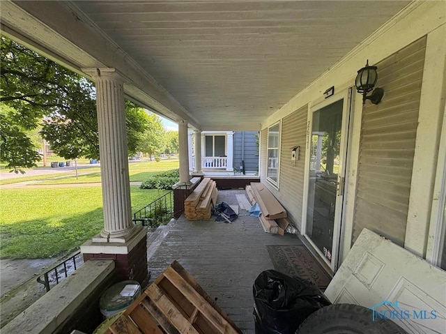 2631 Parkwood Ave, Toledo, OH 43610 - covered porch with a lawn