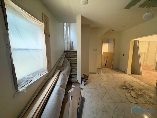 2631 Parkwood Ave, Toledo, OH 43610 - corridor featuring stairs and light marble finish flooring