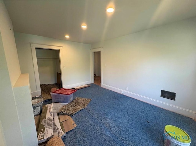 2631 Parkwood Ave, Toledo, OH 43610 - unfurnished bedroom with carpet, recessed lighting, and a closet