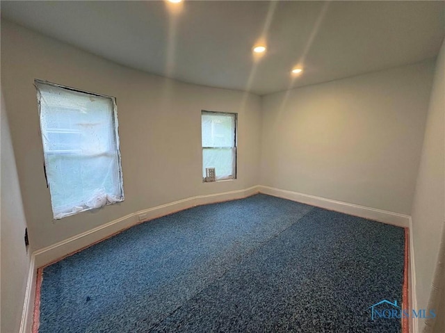 2631 Parkwood Ave, Toledo, OH 43610 - empty room with carpet and recessed lighting