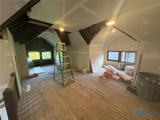 2631 Parkwood Ave, Toledo, OH 43610 - additional living space featuring hardwood / wood-style flooring and vaulted ceiling