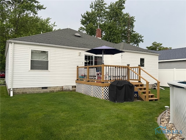 441 S Pine St, Deshler, OH 43516 - rear view of house featuring a wooden deck, crawl space, a shingled roof, and a yard