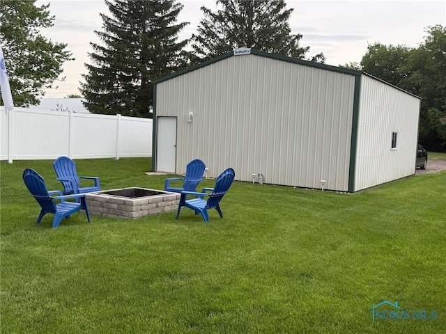 441 S Pine St, Deshler, OH 43516 - view of yard with an outbuilding and a fire pit
