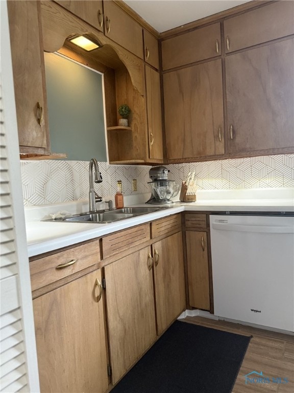 441 S Pine St, Deshler, OH 43516 - kitchen with white dishwasher, backsplash, light countertops, dark wood-type flooring, and open shelves