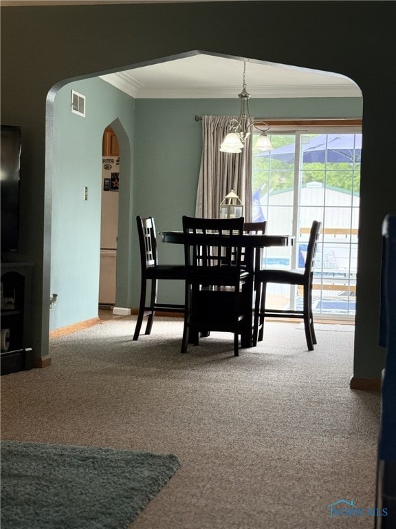 441 S Pine St, Deshler, OH 43516 - carpeted dining area with arched walkways and crown molding
