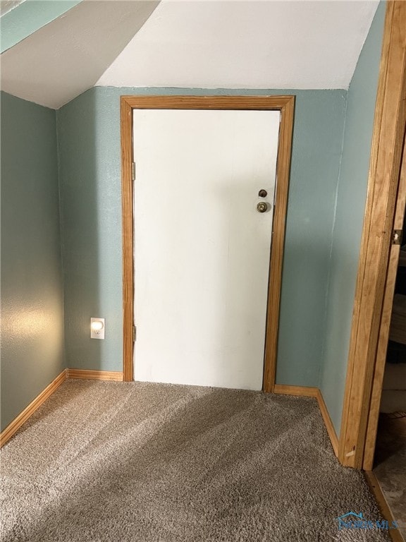 441 S Pine St, Deshler, OH 43516 - carpeted spare room with vaulted ceiling and baseboards