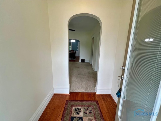 1810 E Broadway St, Toledo, OH 43605 - hallway featuring arched walkways and wood finished floors