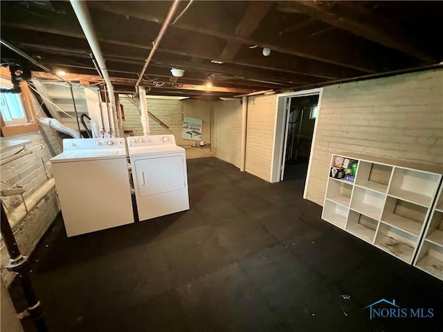 1810 E Broadway St, Toledo, OH 43605 - unfinished below grade area featuring separate washer and dryer