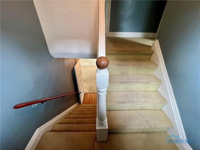 1810 E Broadway St, Toledo, OH 43605 - staircase featuring carpet floors and baseboards
