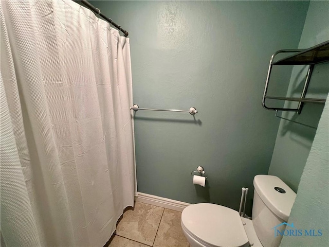 1810 E Broadway St, Toledo, OH 43605 - full bath featuring tile patterned floors and a shower with curtain