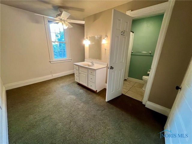 1810 E Broadway St, Toledo, OH 43605 - unfurnished bedroom featuring dark colored carpet and connected bathroom