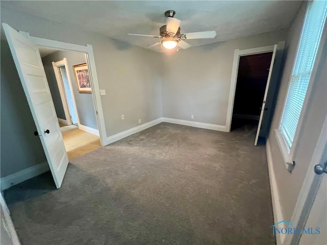 1810 E Broadway St, Toledo, OH 43605 - unfurnished bedroom with carpet and ceiling fan