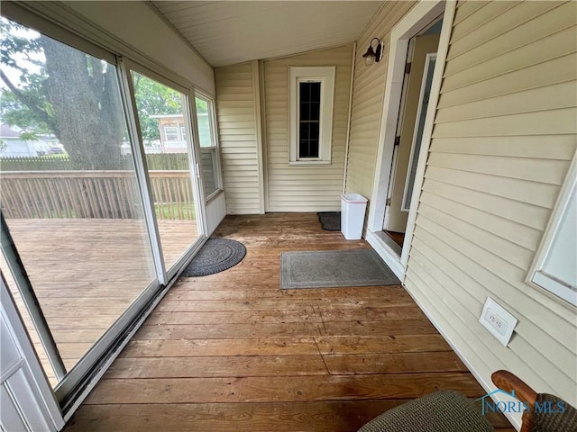 1810 E Broadway St, Toledo, OH 43605 - unfurnished sunroom featuring vaulted ceiling