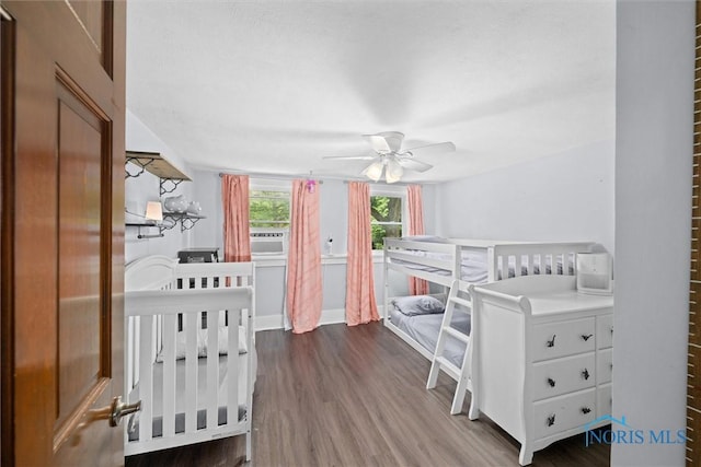 2617 Shetland Rd, Toledo, OH 43617 - bedroom featuring dark wood finished floors, cooling unit, and ceiling fan