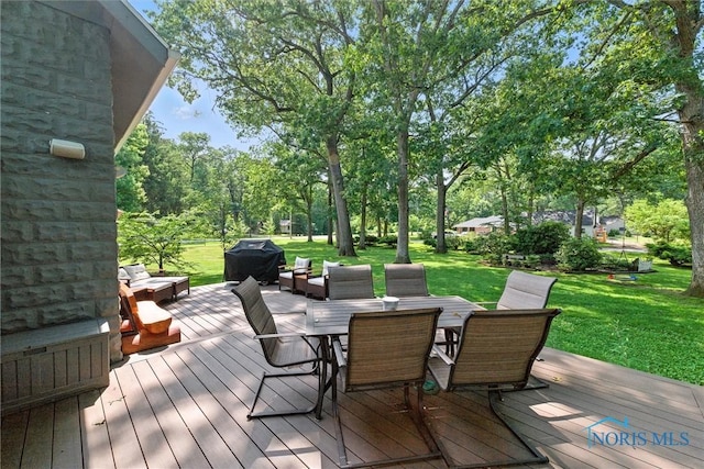 2617 Shetland Rd, Toledo, OH 43617 - wooden deck with a lawn, outdoor dining area, and grilling area