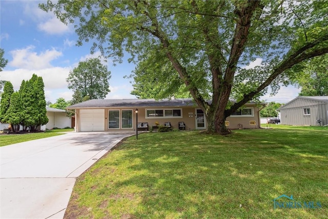 3530 Devon Hill Rd, Toledo, OH 43606 - single story home with an attached garage, driveway, and a front yard