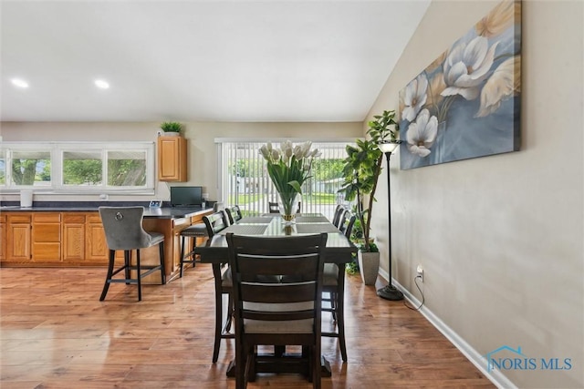 3530 Devon Hill Rd, Toledo, OH 43606 - dining space with light wood-style floors, recessed lighting, and lofted ceiling