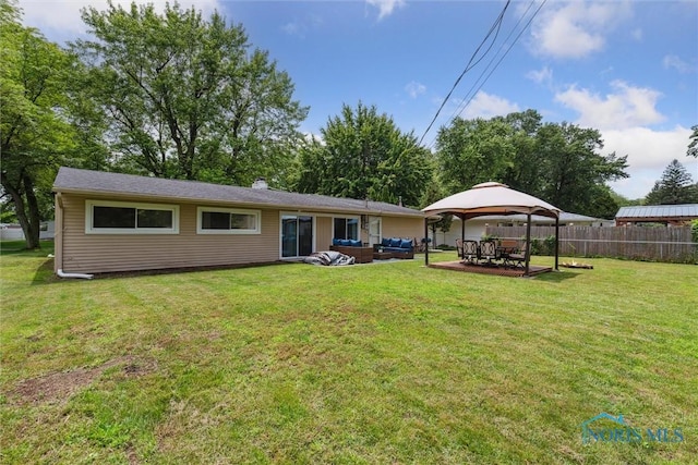 3530 Devon Hill Rd, Toledo, OH 43606 - rear view of house with a gazebo, an outdoor hangout area, a patio area, and a chimney