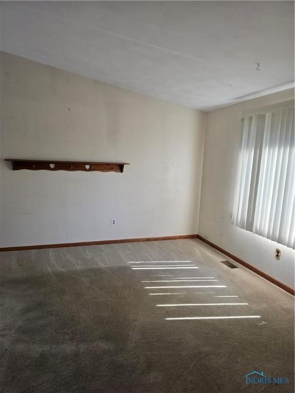 4745 Ottawa Trail Dr, Toledo, OH 43611 - empty room featuring carpet floors and baseboards