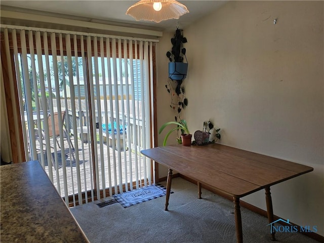 4745 Ottawa Trail Dr, Toledo, OH 43611 - dining room with carpet floors