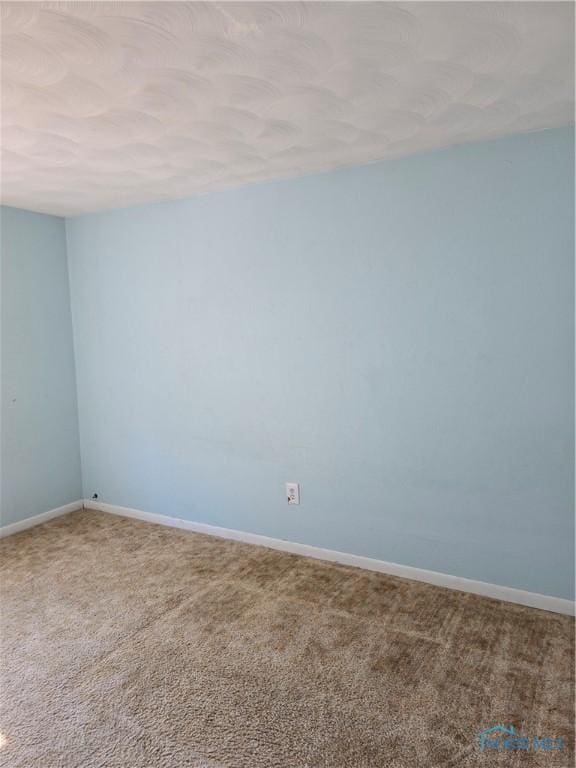 4745 Ottawa Trail Dr, Toledo, OH 43611 - carpeted empty room with baseboards