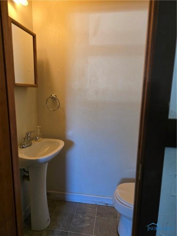 4745 Ottawa Trail Dr, Toledo, OH 43611 - half bath with baseboards and tile patterned flooring