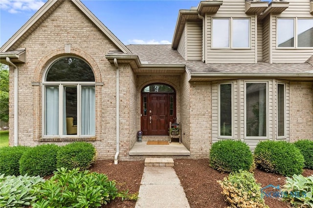 14285 Cuckle Creek Rd, Bowling Green, OH 43402 - doorway to property featuring brick siding and roof with shingles