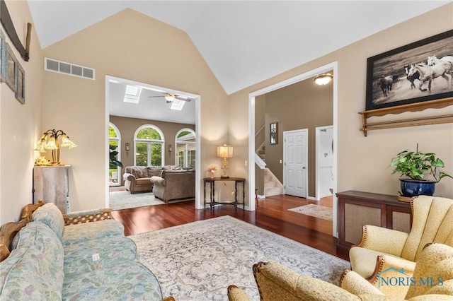 14285 Cuckle Creek Rd, Bowling Green, OH 43402 - living room with high vaulted ceiling, wood finished floors, stairs, and a skylight
