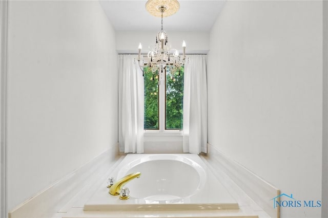 14285 Cuckle Creek Rd, Bowling Green, OH 43402 - full bathroom with a chandelier and a garden tub