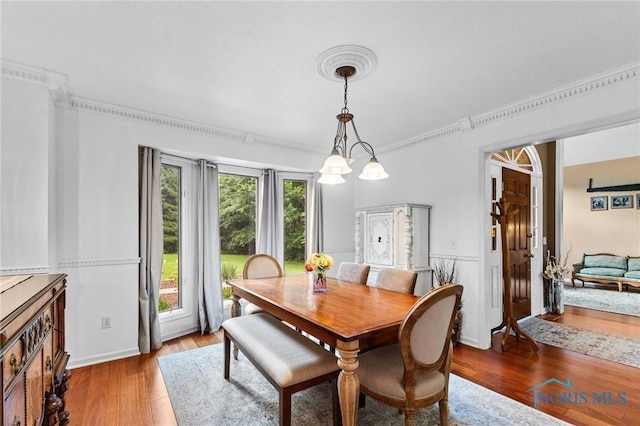 14285 Cuckle Creek Rd, Bowling Green, OH 43402 - dining space with wood finished floors and ornamental molding