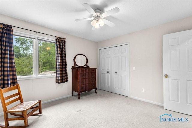 14285 Cuckle Creek Rd, Bowling Green, OH 43402 - bedroom with light carpet, a closet, and ceiling fan