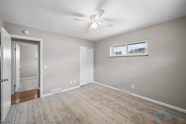 3431 146th St, Toledo, OH 43611 - unfurnished bedroom with carpet floors, a closet, and a ceiling fan