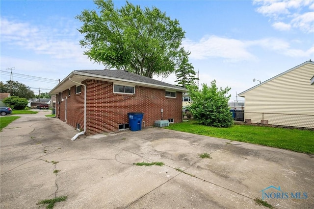 3431 146th St, Toledo, OH 43611 - rear view of house with brick siding